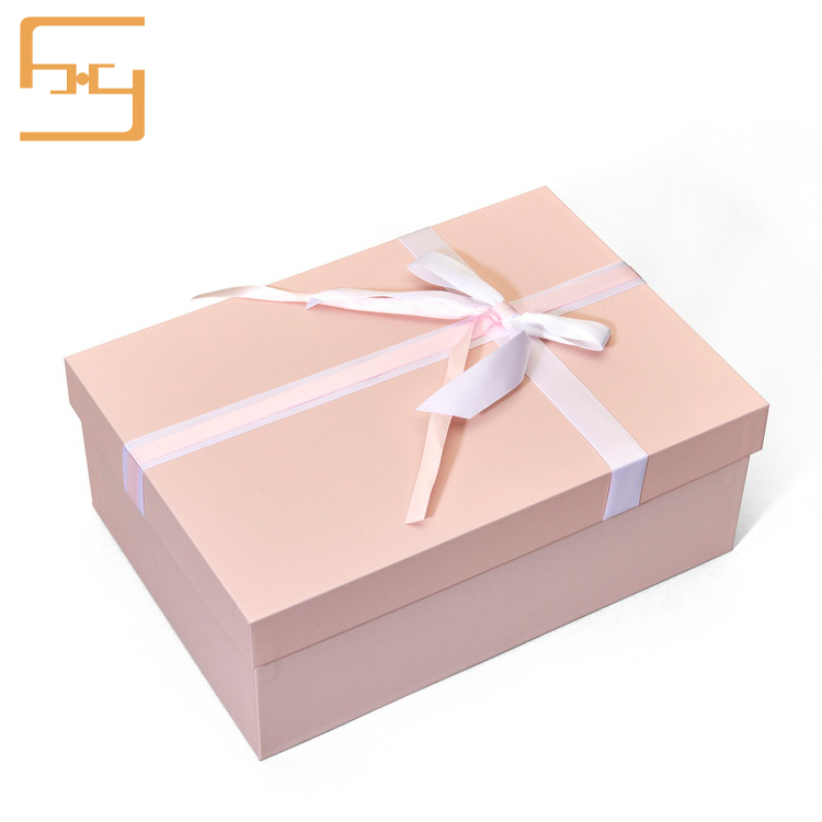Pink gift box with ribbon
